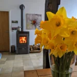 Blumen mit Kaminofen – Mühlenhof