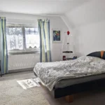 Doppelbett oben mit Gartenblick – Mühlenhof
